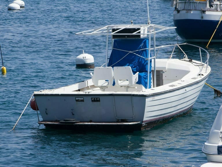 Boat moored in open water