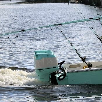 Closeup of boat stern with twin outboards